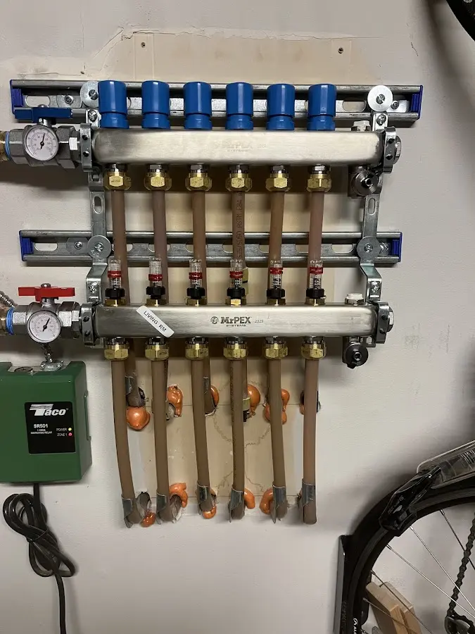 Plumber performing Gas Line Installation at a residential property in Concord